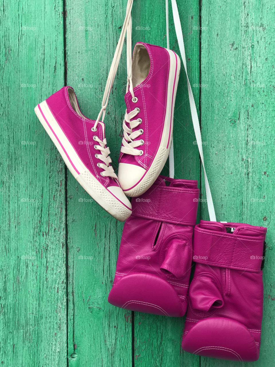 Pink sneakers and pink boxing gloves 