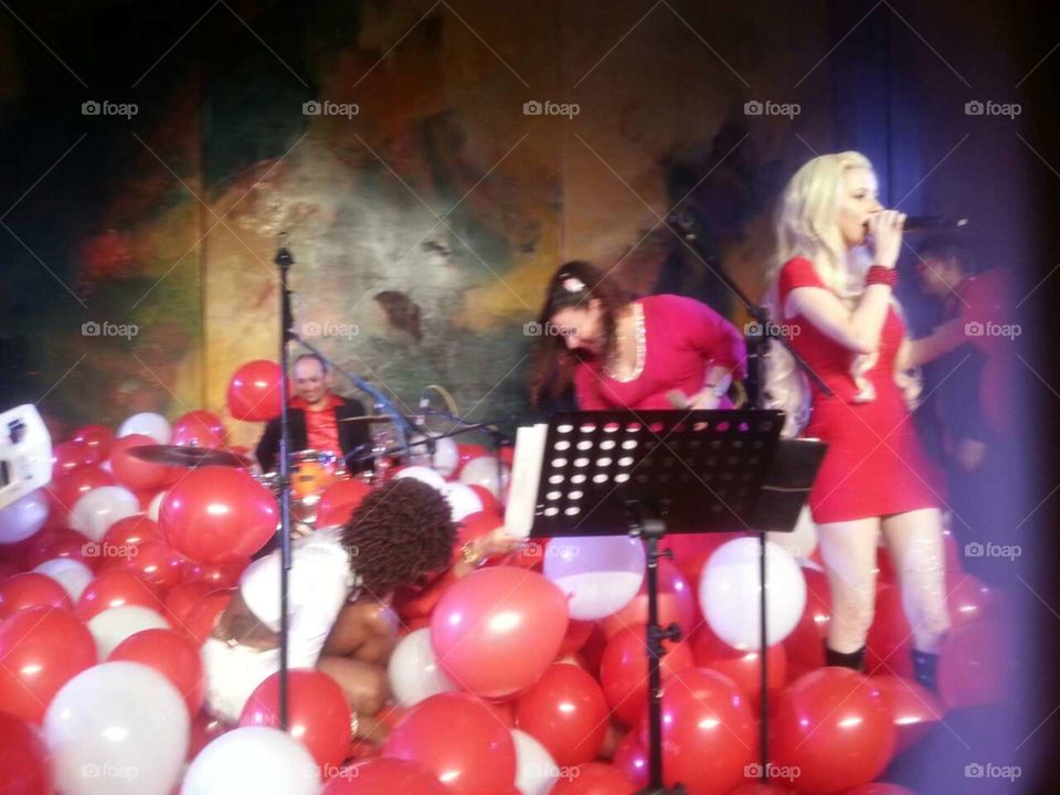 Music party balloons red singers performers host stage 