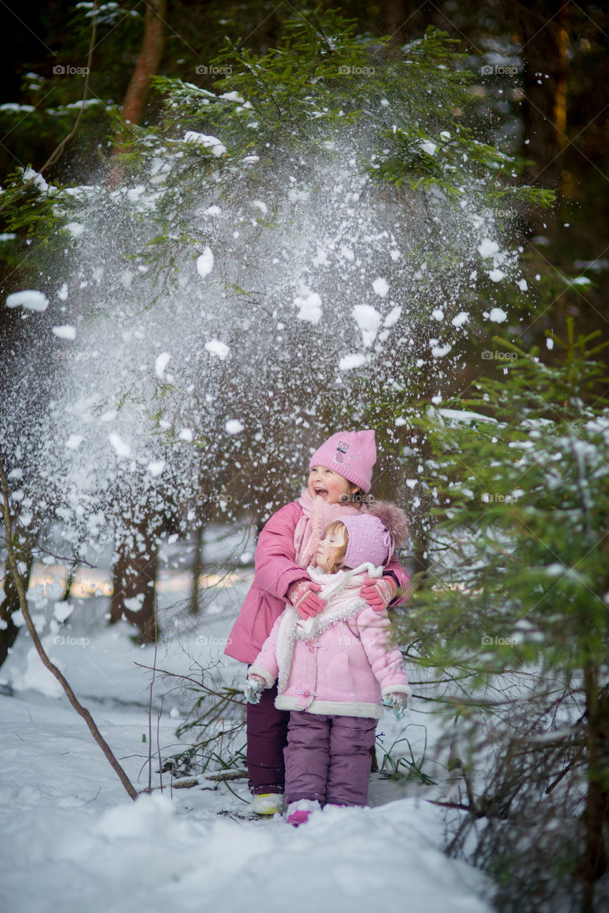 Little sisters in winter park