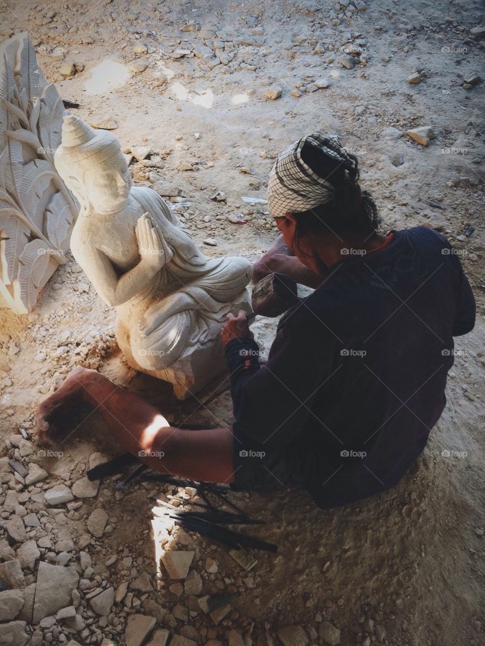 carving the buddha