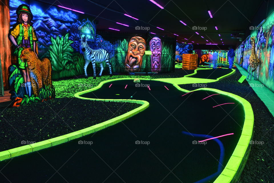 blacklight mini golf. blacklight mini golf