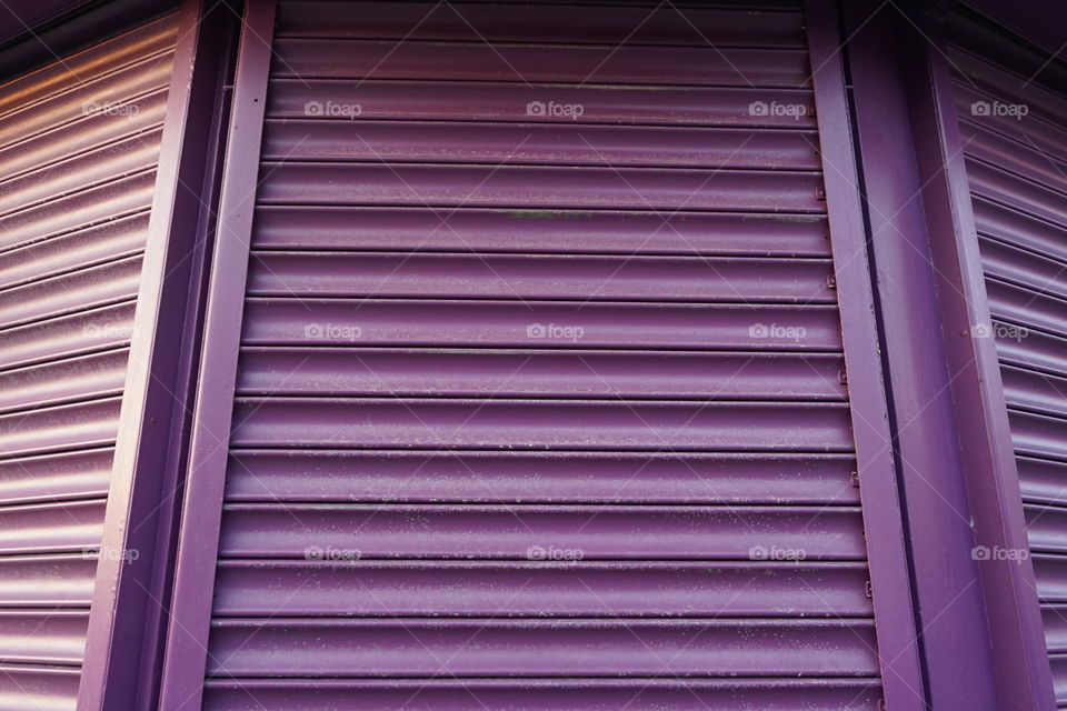 Low angle view of purple shutter