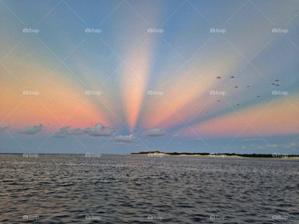 Opposite sunset. Anti-solar rays