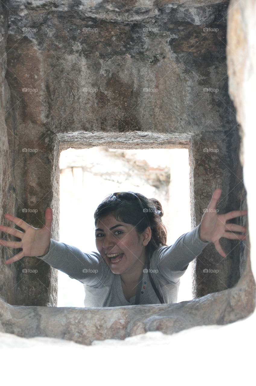 Break through the other side. Taken by Nikon D90 in alanya (turkey) my sister on the other side of the wall