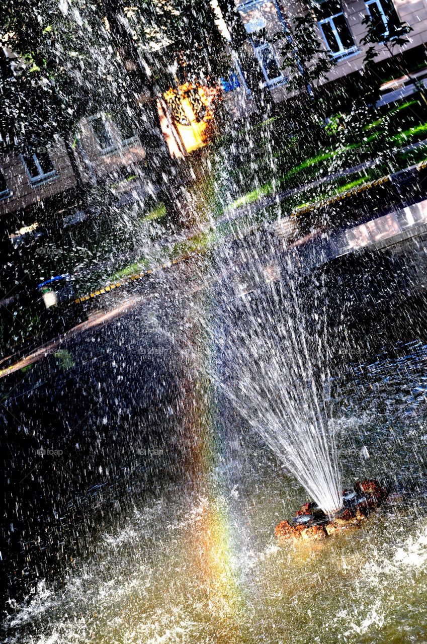 fountain with rainbow