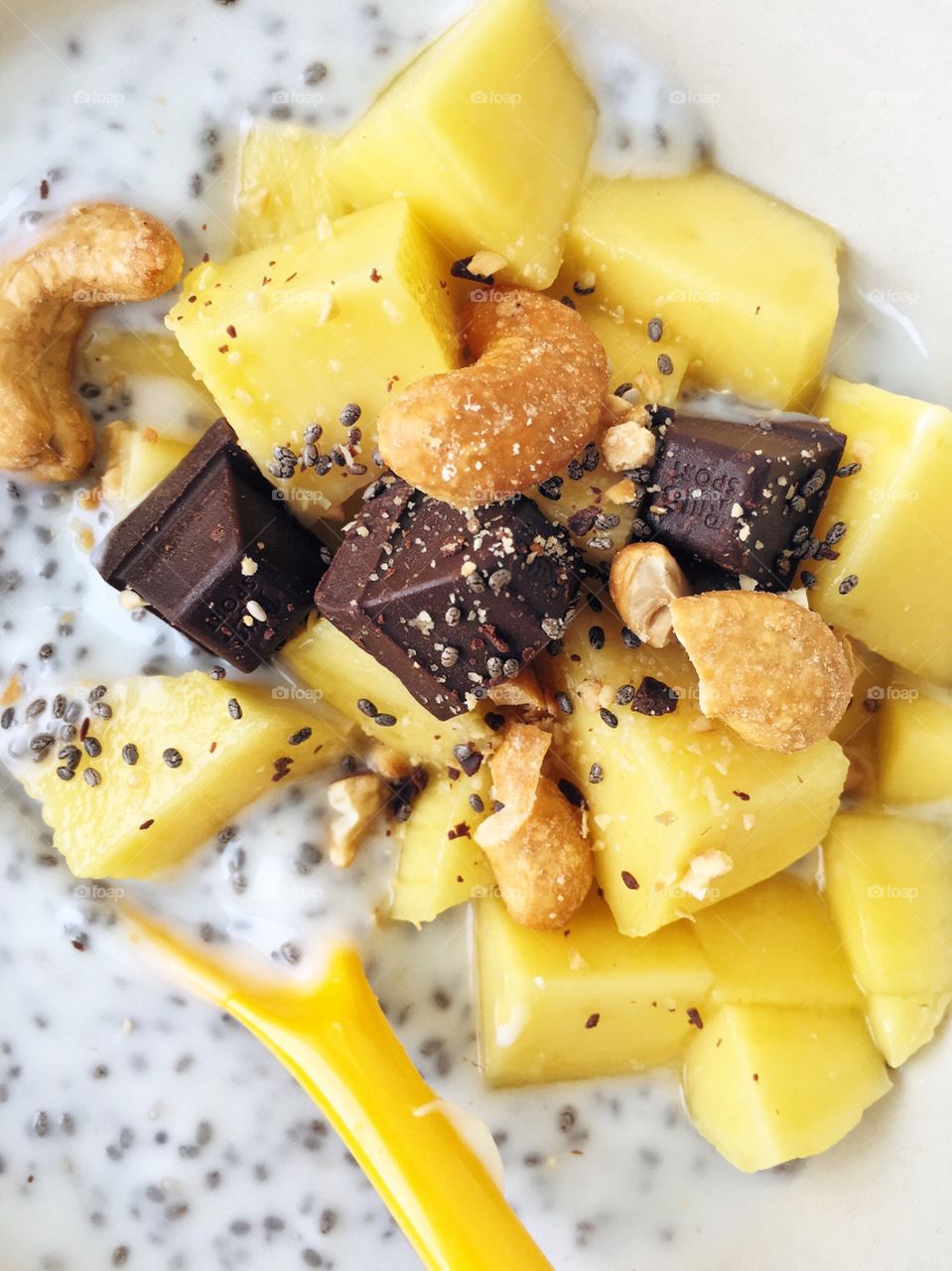 Healthy breakfast bowl with mango and chia seed
