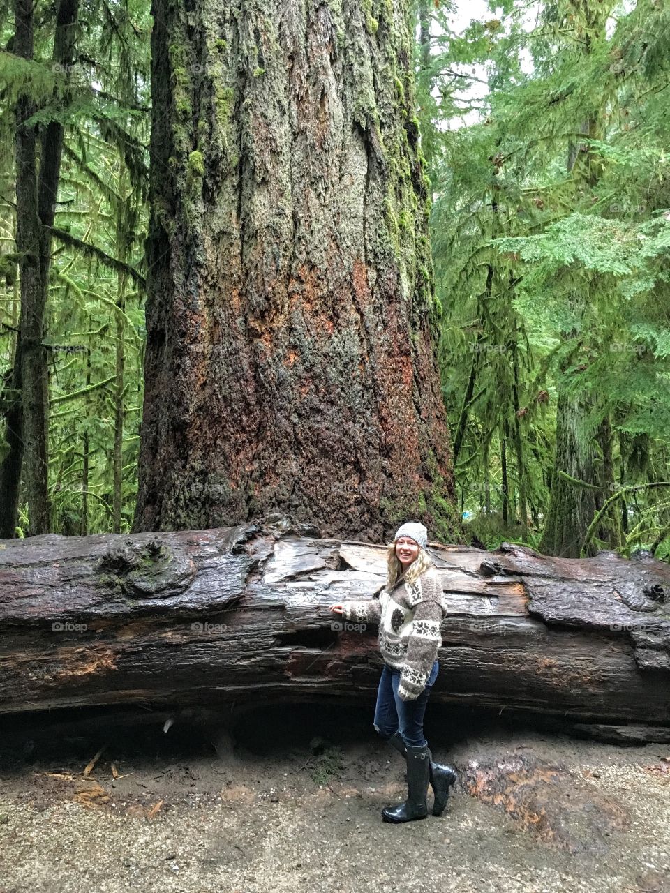 West Coast girl in Cowichan sweater enjoying MacMillan Provincial Park on Vancouver Island. 