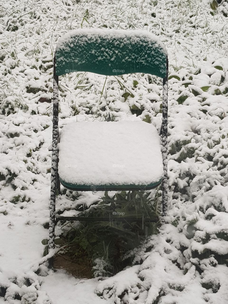lonely chair in the snow