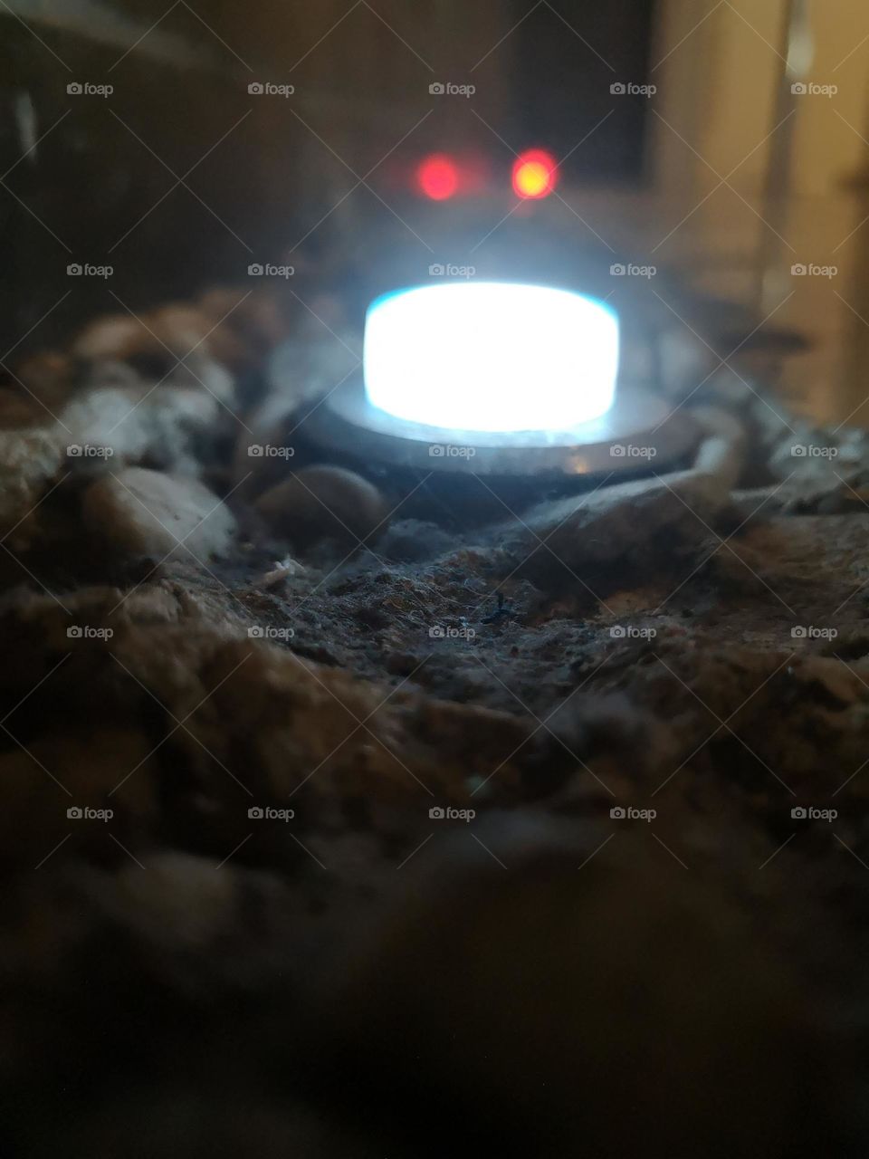 This led lighting display is made up of a regular bottled water cap