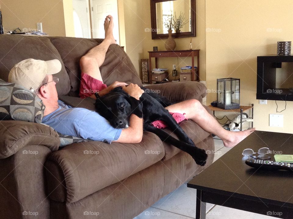 Making room for daddy, lazy lap dog..