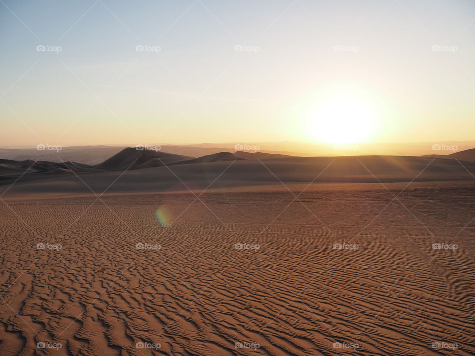 Sunset over sand dunes