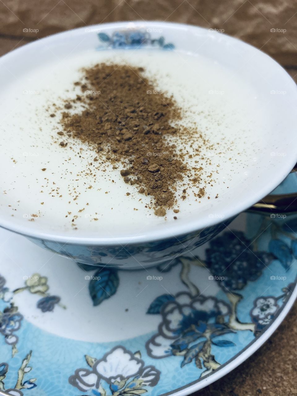 on the plate, sahlab with cinnamon 