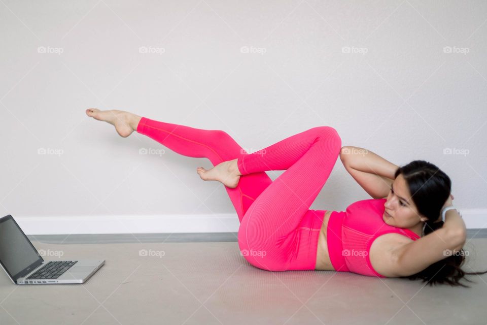 Woman working out at home 