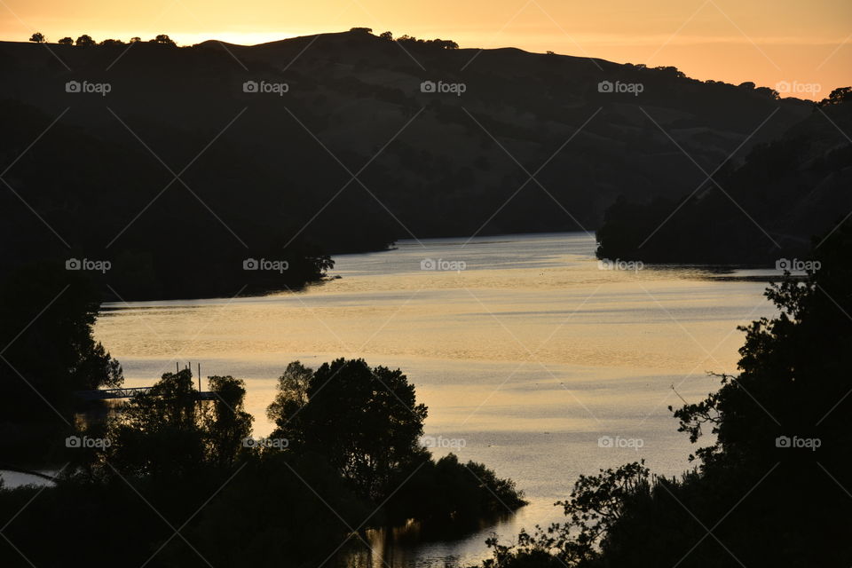 Orange colored sky during summer sunset