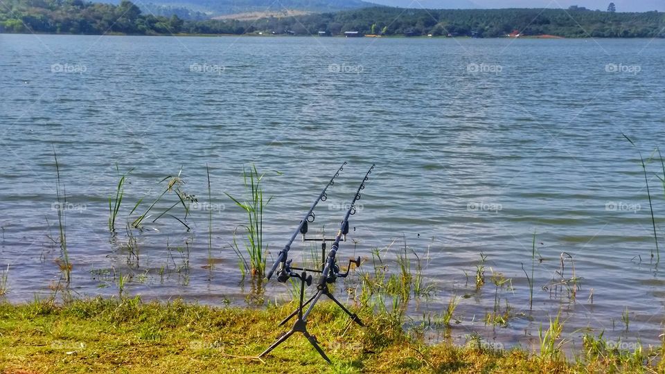 Fishing rods on the bank ready to catch some fish