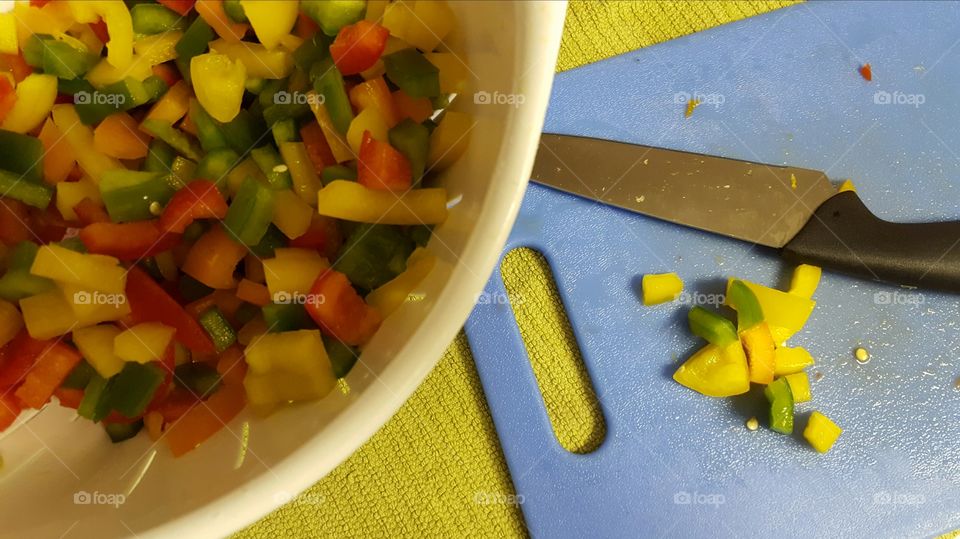 Cutting bell peppers for Fajita Chicken Pasta.