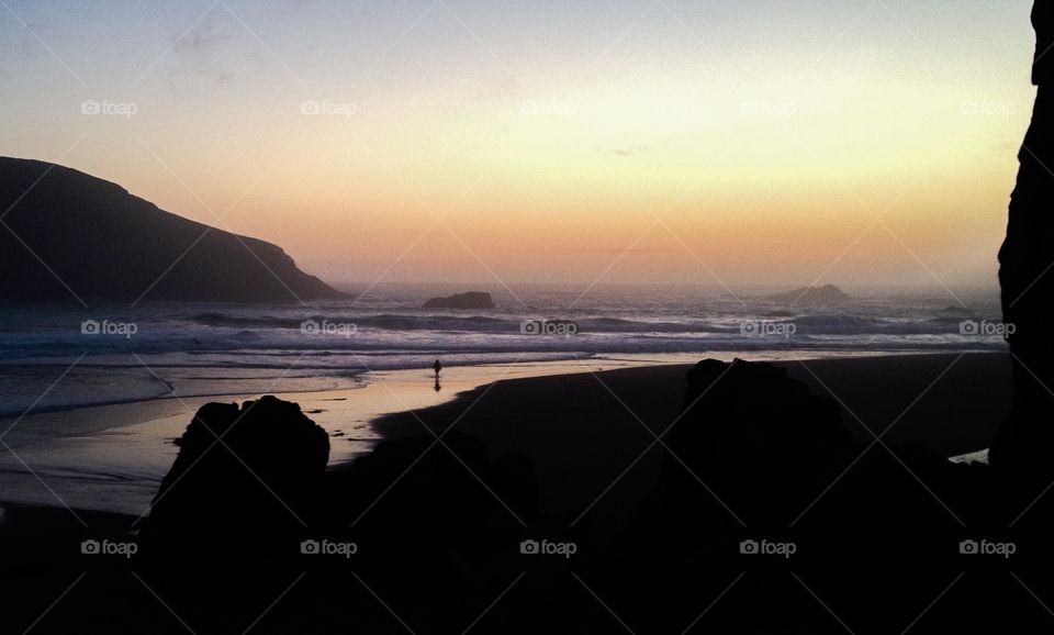 Beach stroll at sunset