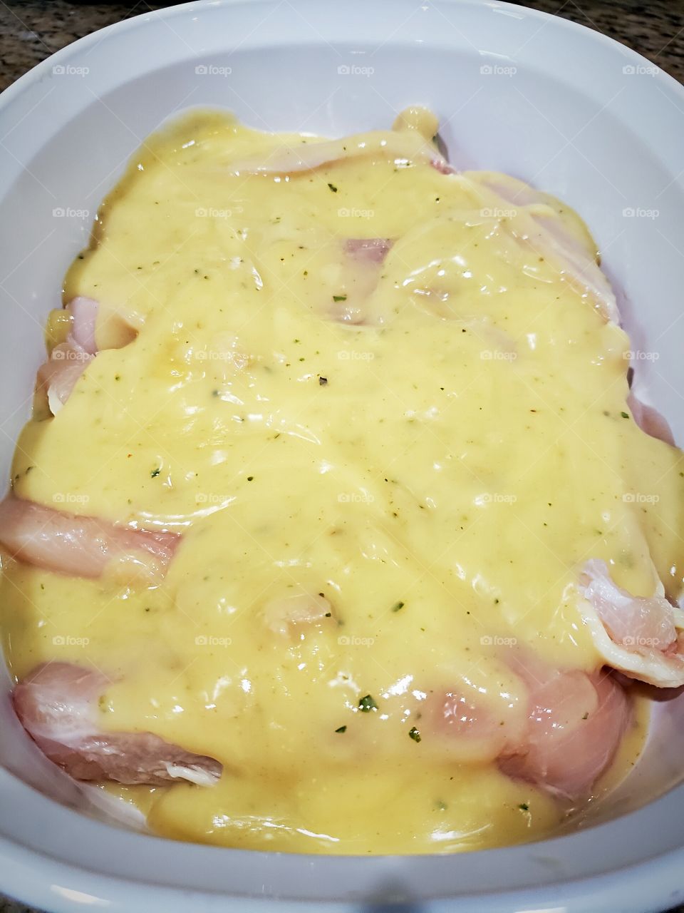 garlic herb chicken ready to bake