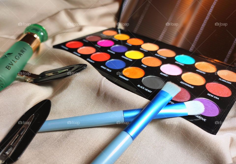 Beauty products /Makeup accessories /Makeup pallet and brushes / Colourful makeup pallet and beauty accessories /Product photography