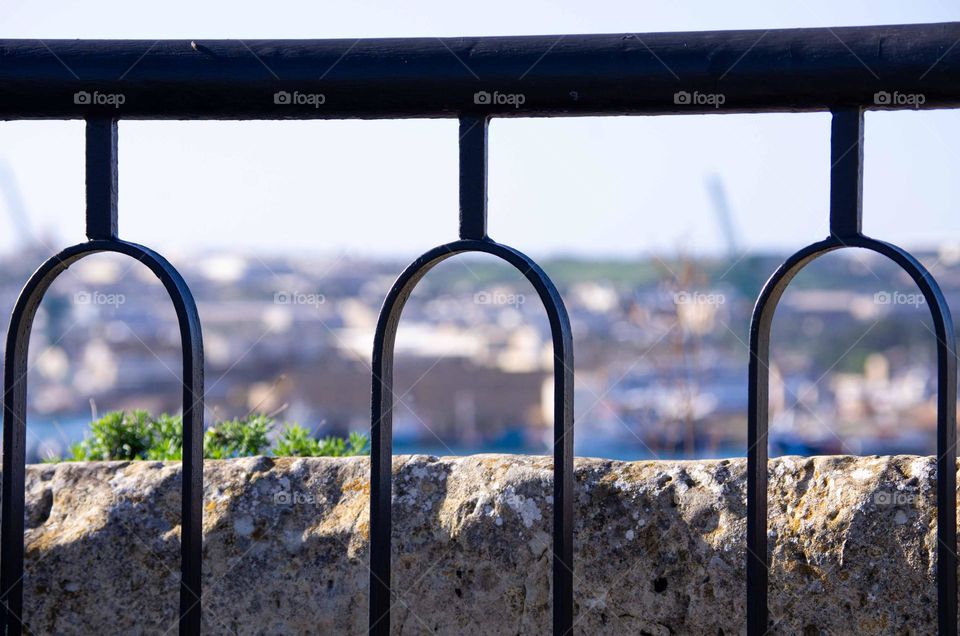 detail of railing overlooking grand Harbour in LA valletta