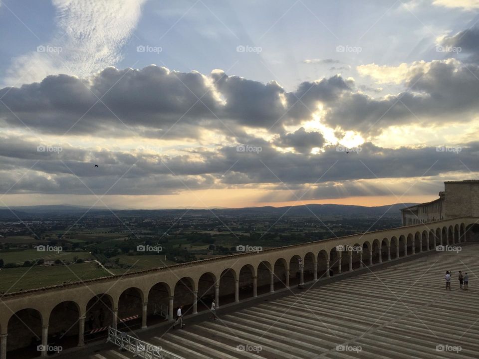 Basilica of San Francesco porch at sunset, Assisi, Umbria, Italy 