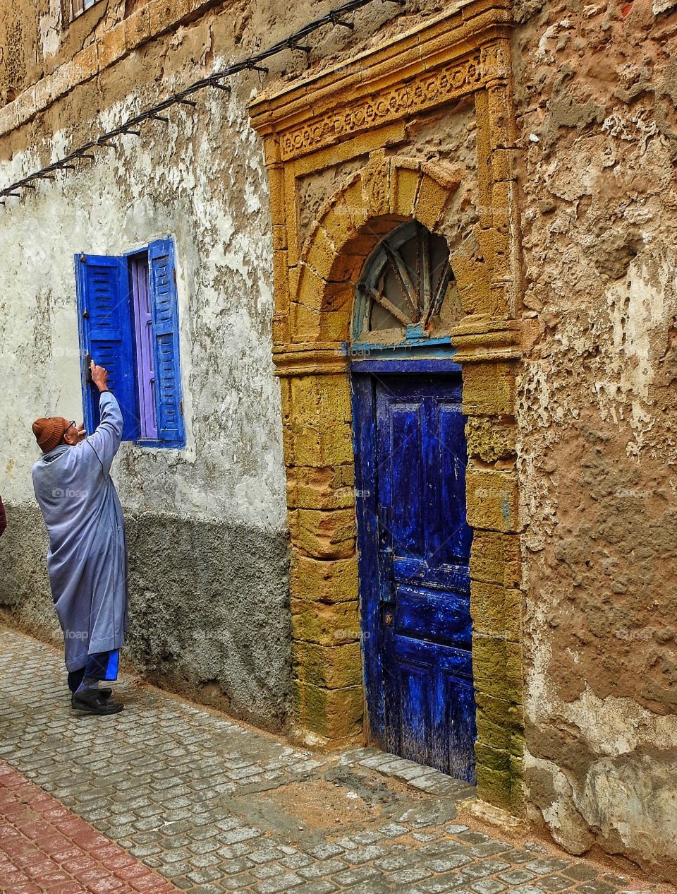 Man opening window