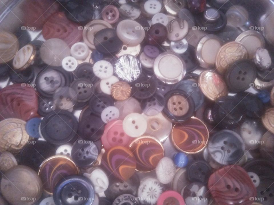  buttons  of pants and shirt.