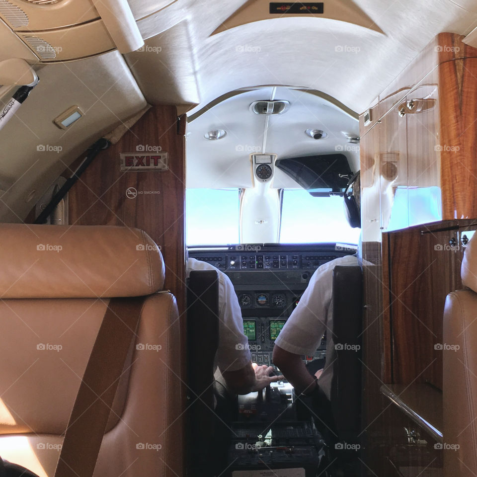 Pilots flying a Lear Jet