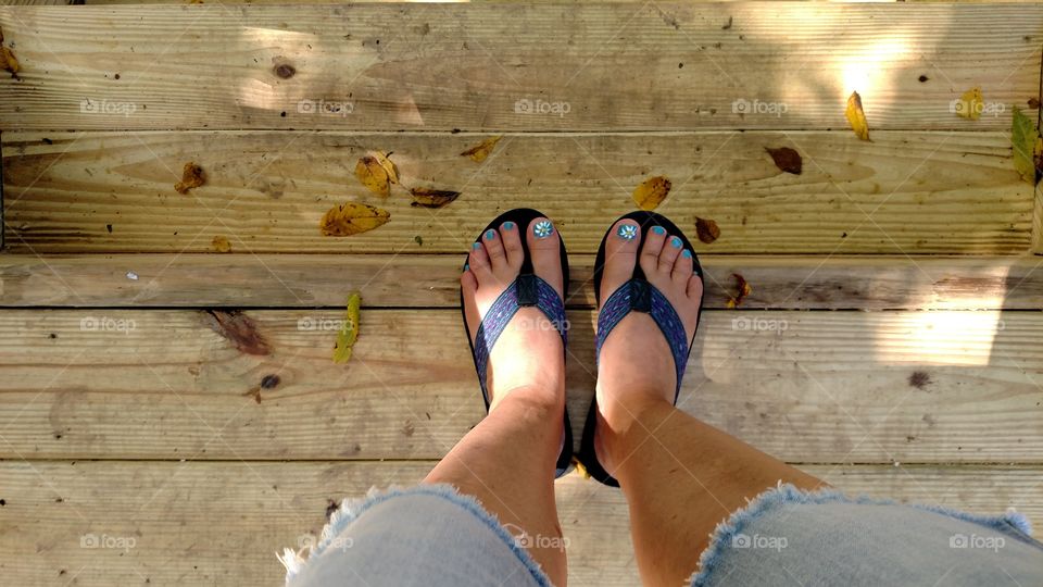 From where I stand on the newly built deck and stairs I see that the leaves a beginning to turn yellow and fall off the trees a sure sign of fall