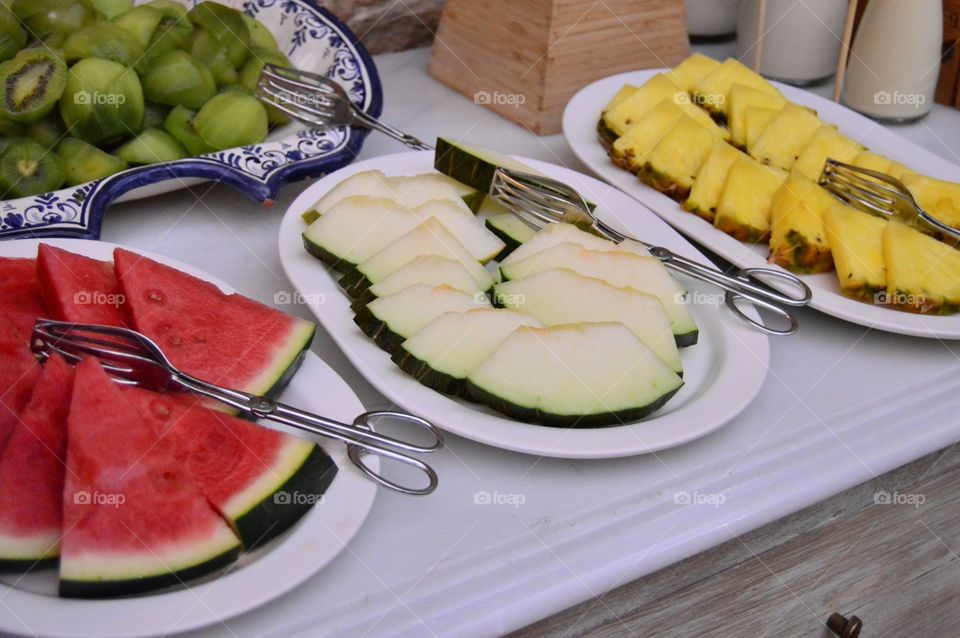 Variety of fruits plate on table