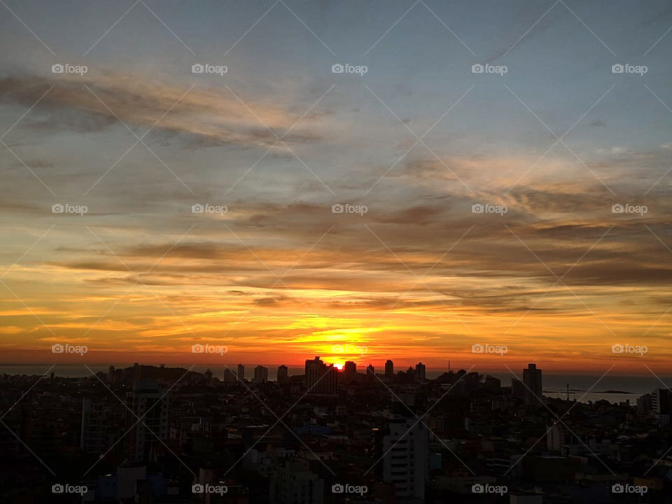 While the city sleeps. Waking up early rewarding. I am lucky to have this view and every day to be able to see a new sunrise. The beauty is in it will never be the same.