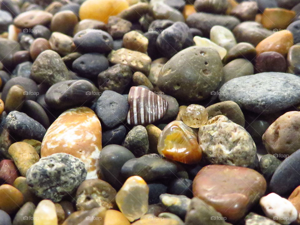 Full frame of pebbles at beach