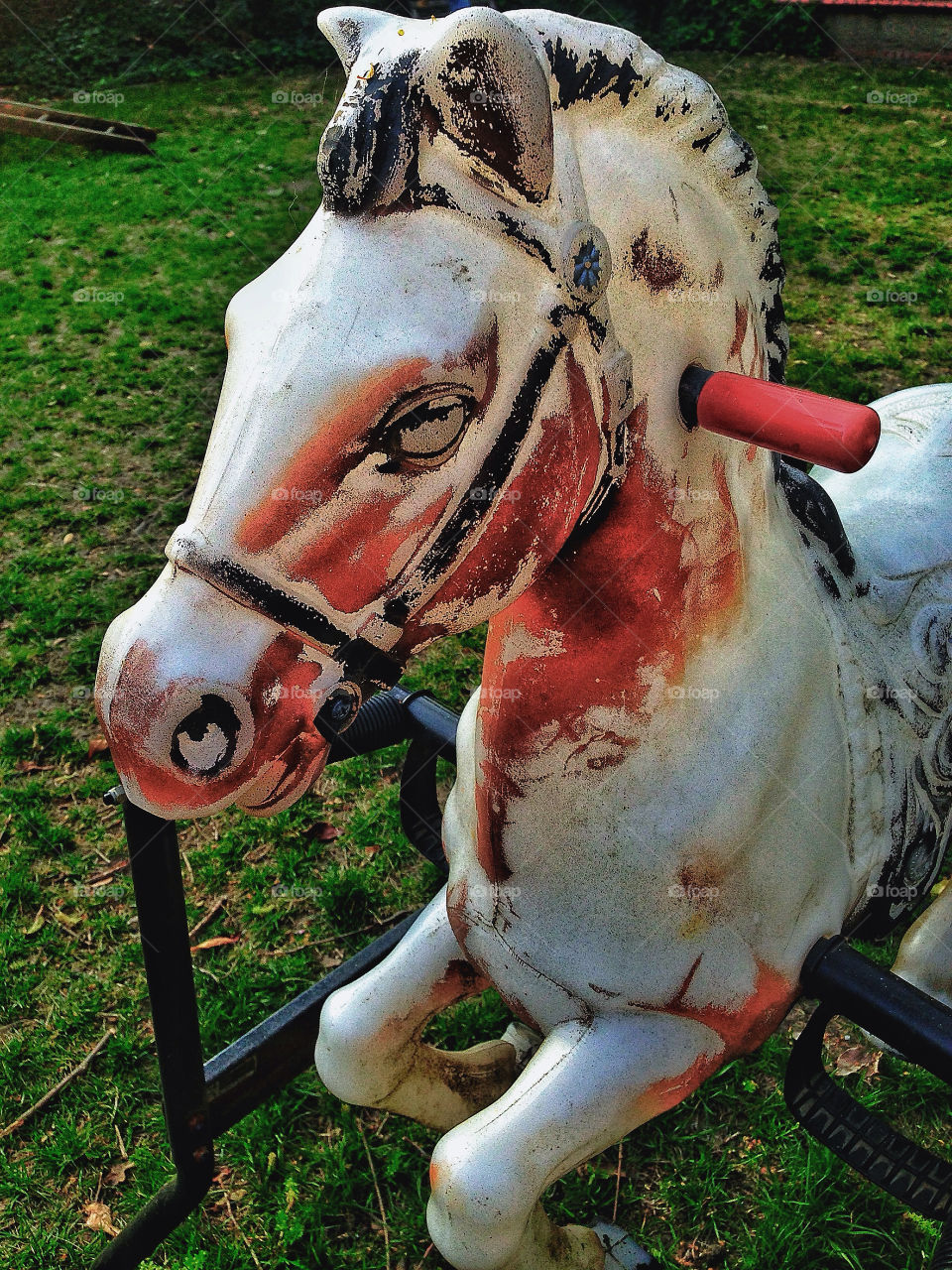 Slightly creepy vintage antique childrens rocking horse toy