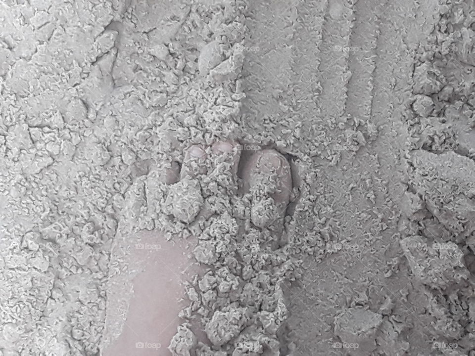 my foot on the sand