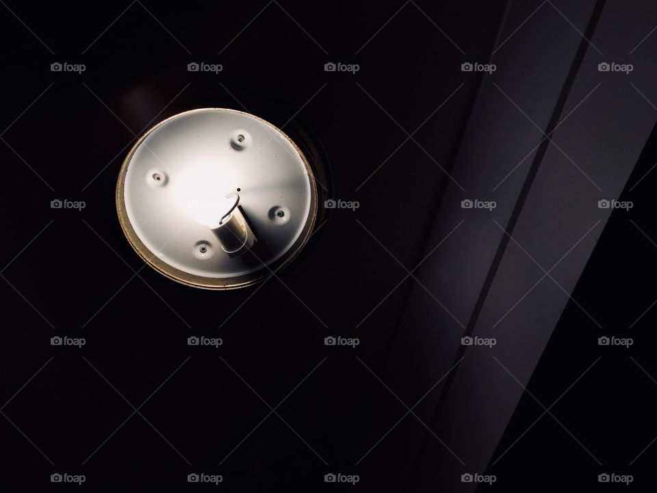 A light bulb in the dark.