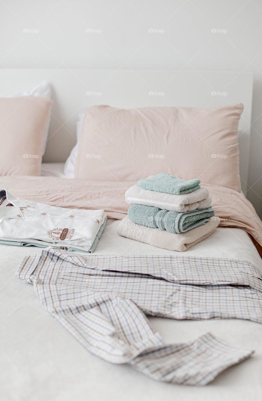 The freshly made bed also doubles as a place to fold your clean laundry before putting it back in the closet.