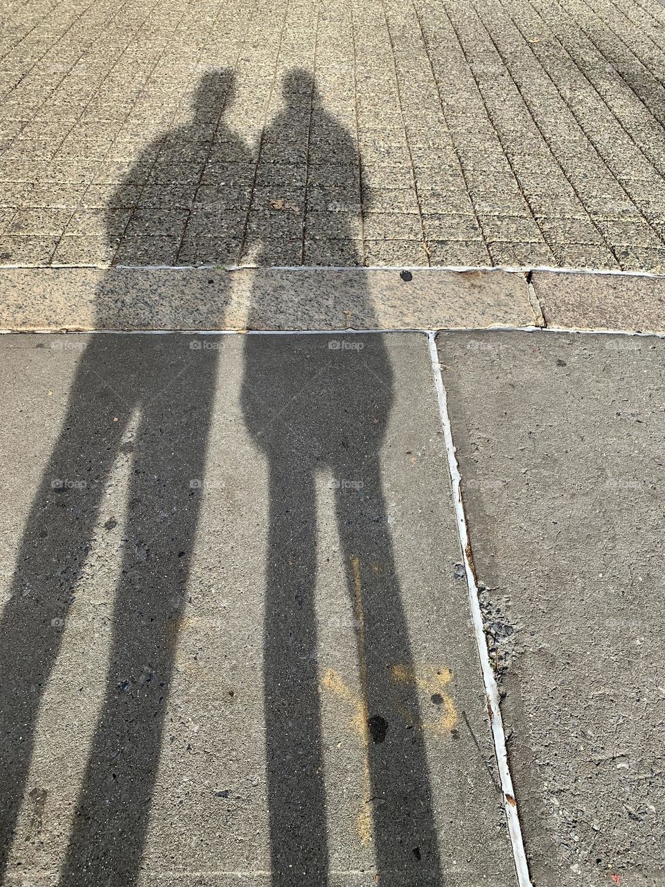 Man and woman shadows.