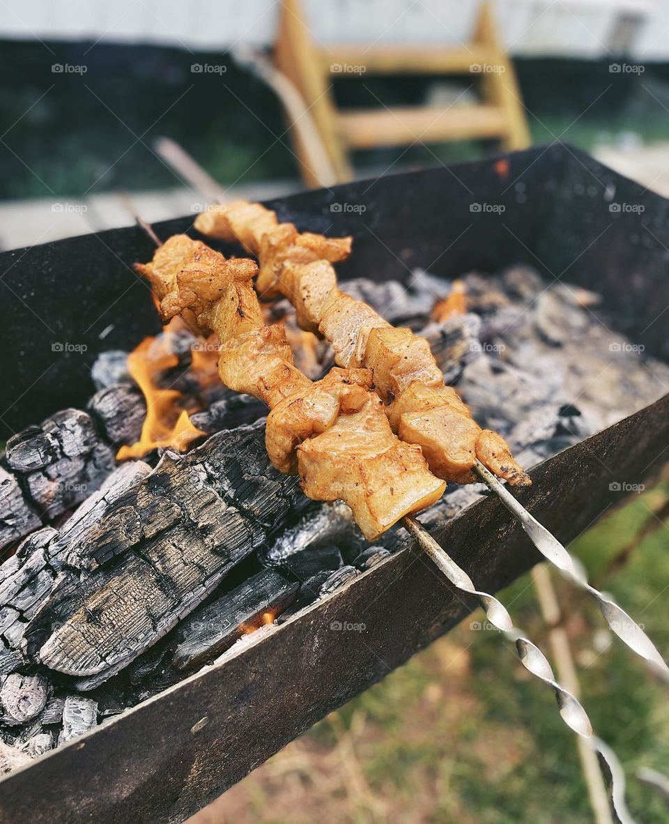 Cooking meat on the brazier