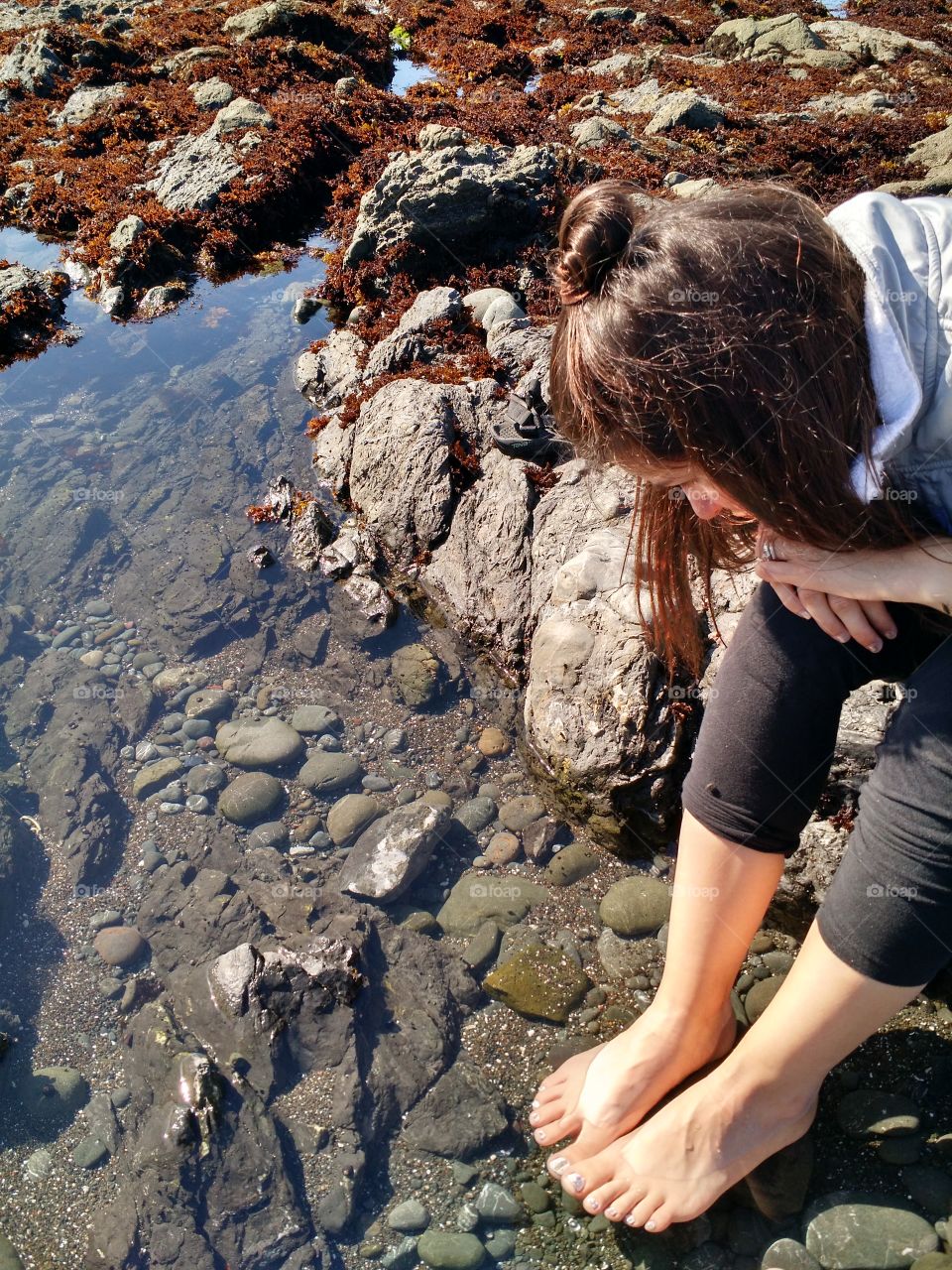 Searching tide pools. Oregon coast