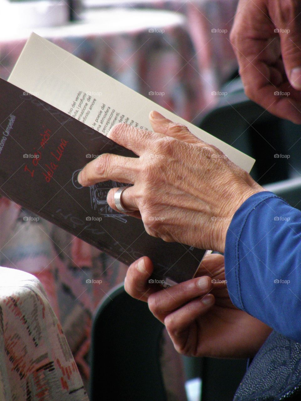 Woman hands holding a book