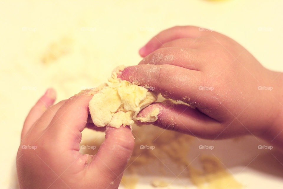 child playing with dough