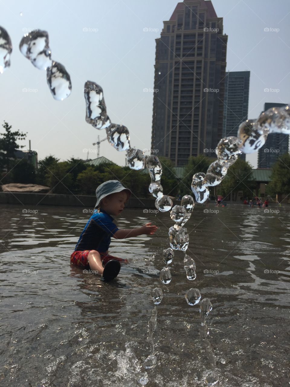Boy playing in water