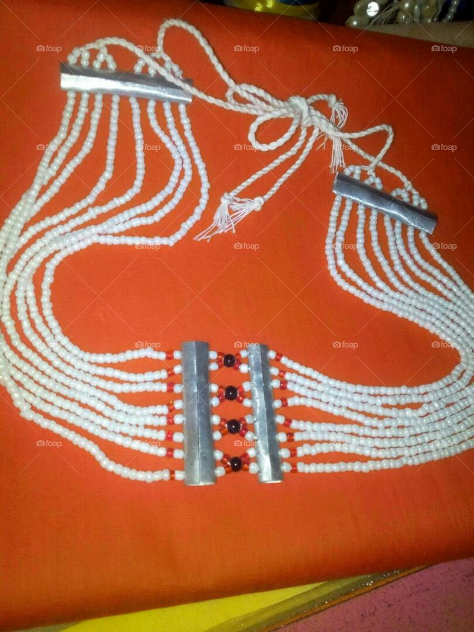 Traditional art, craft necklace