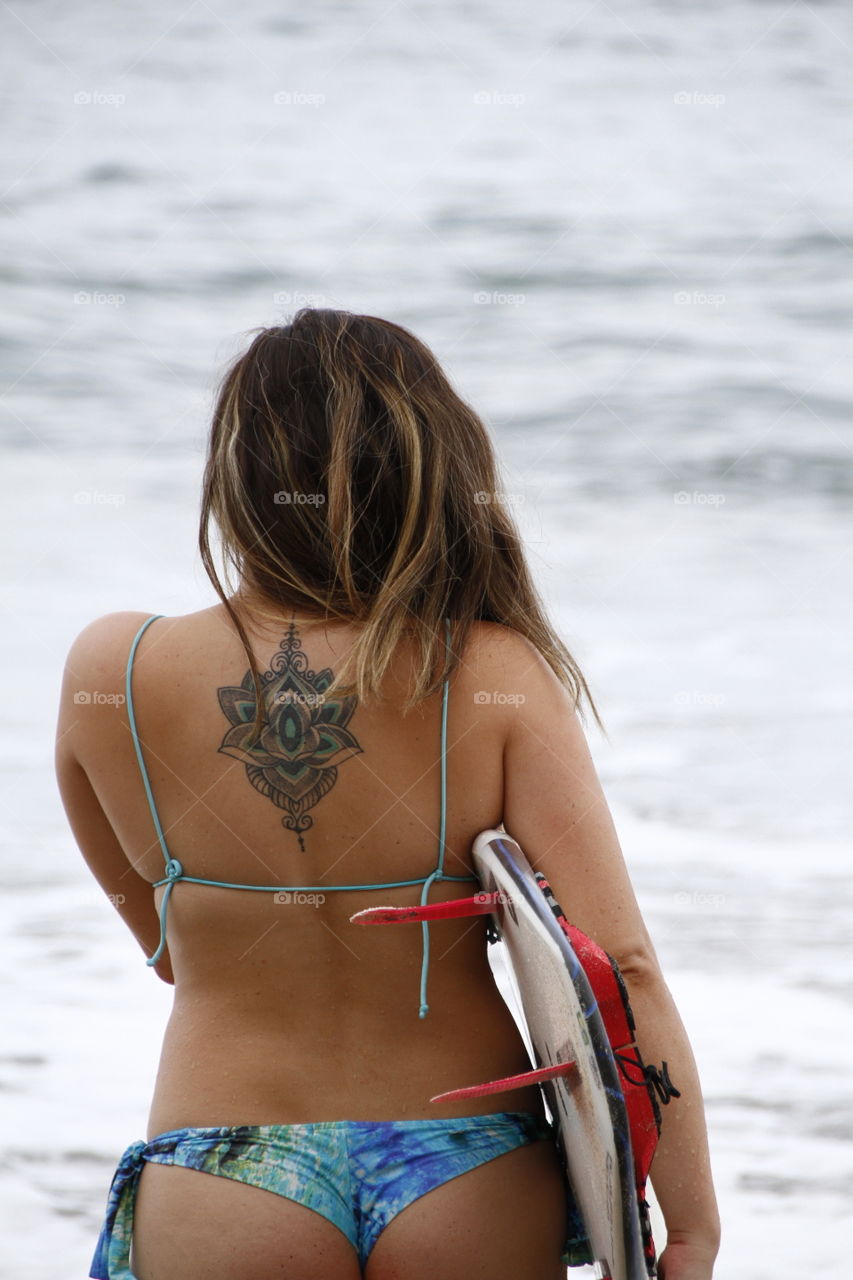 girl with a surfboard