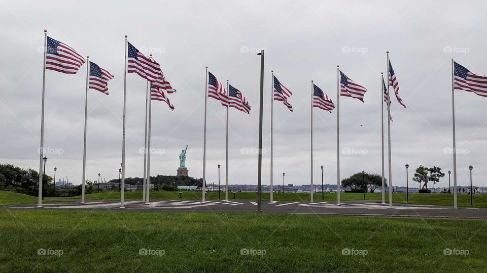 Flags around Statue of Liberty