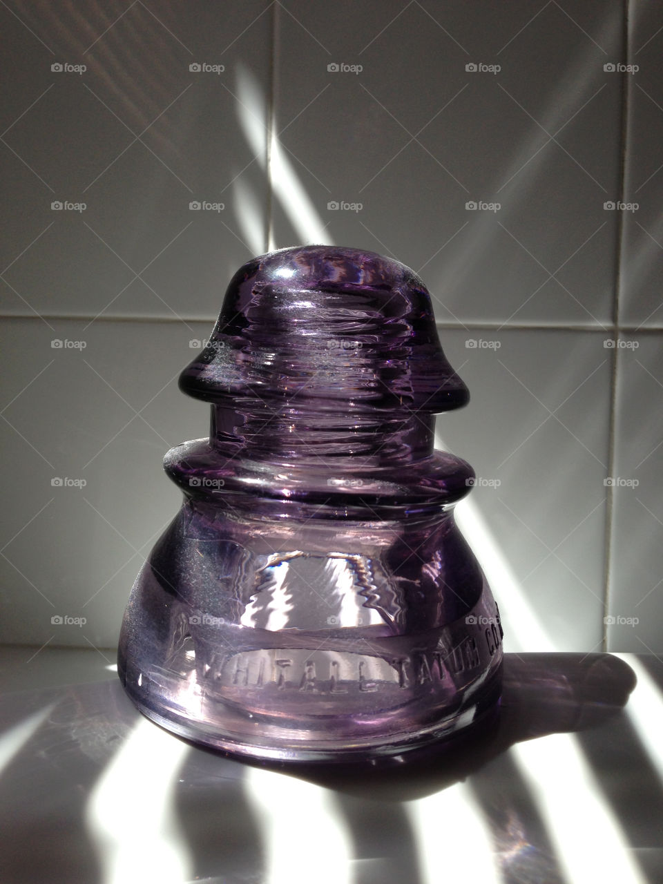 Insulator in lavender and light