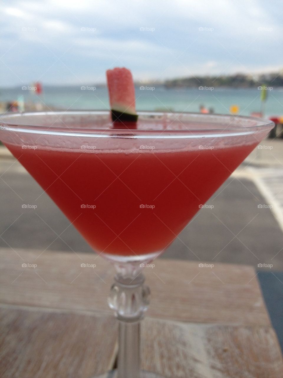 Summer time drink at the beach 