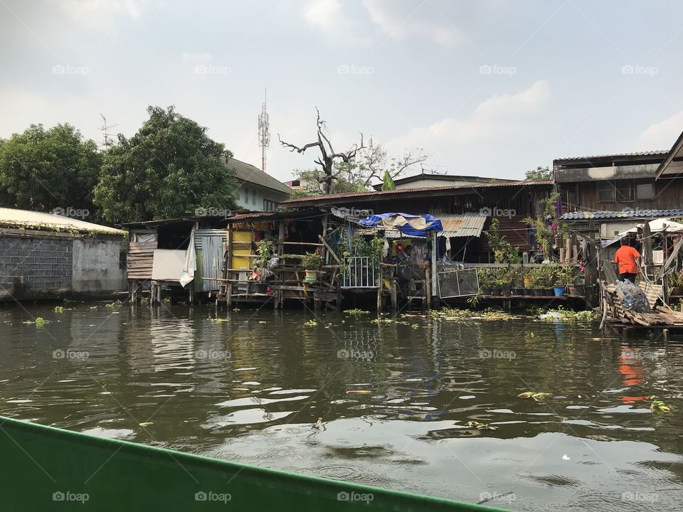 Life on the river. Taking a boat trip down the river, Bangkok, Thailand. 