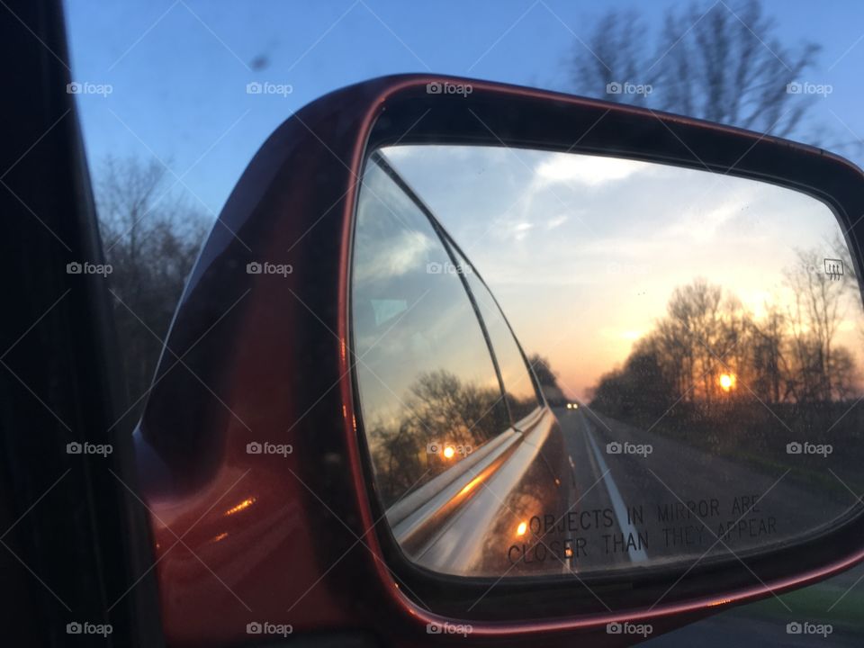 Rear view sunrise reflections 