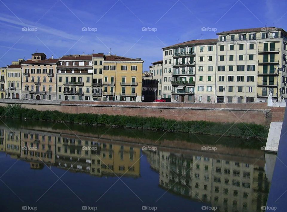 by the river in Pisa